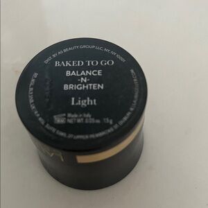 Laura Geller Baked to Go Balance-n-Brighten Light Setting Powder